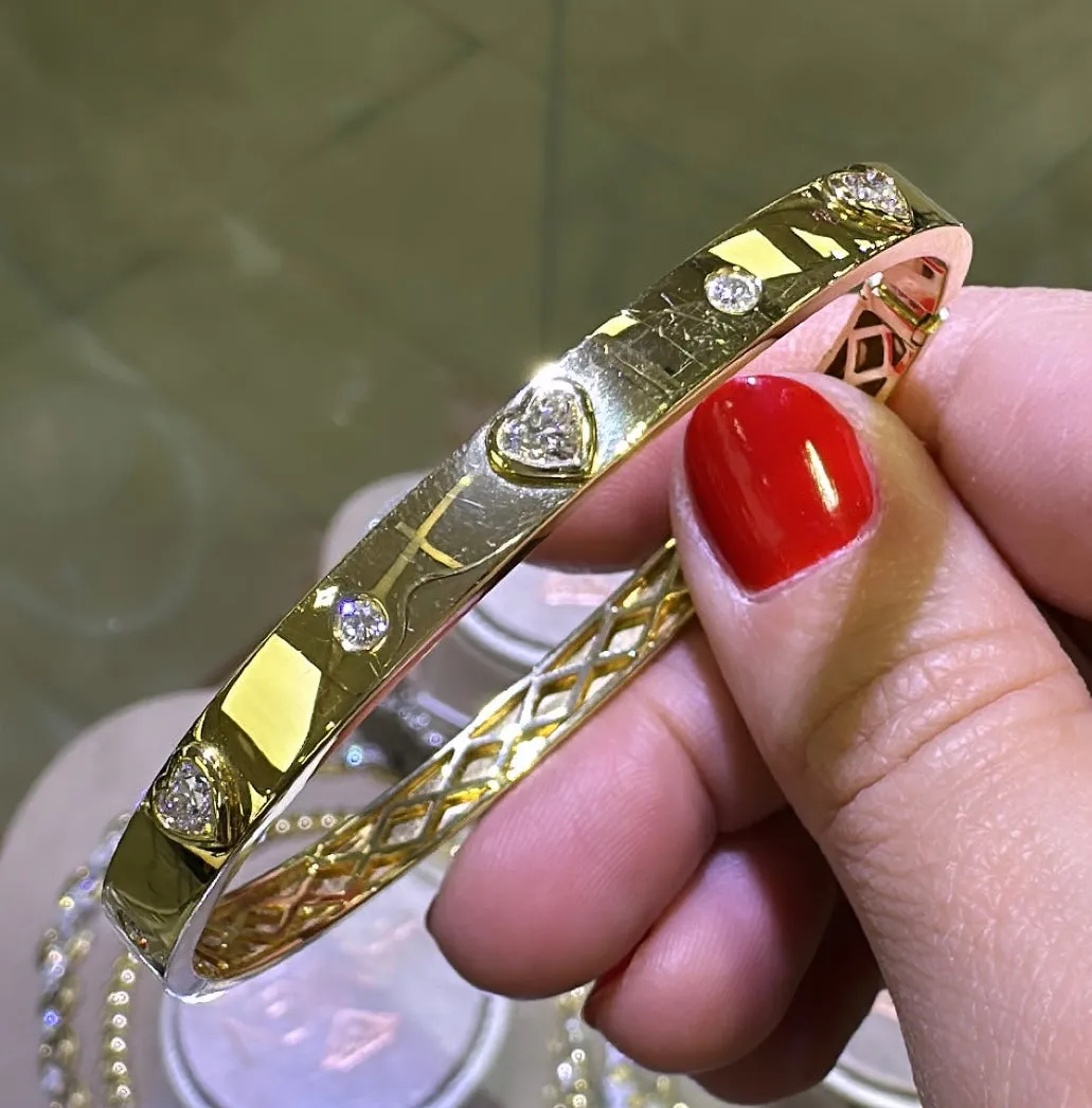 0.71ct tw Burnish Set Heart Diamond Station Bangle Bracelet