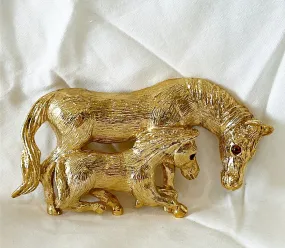 Fabulous vintage mama horse with baby horse designer belt buckle.