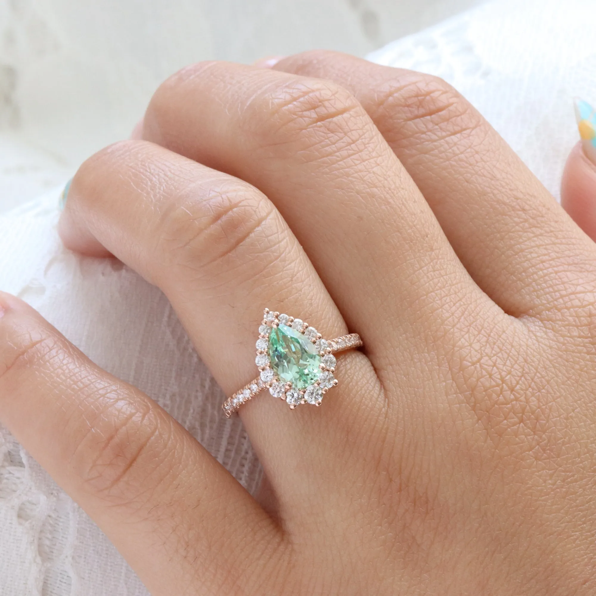 Large Pear Green Sapphire Ring in Tiara Halo Diamond Pave Band