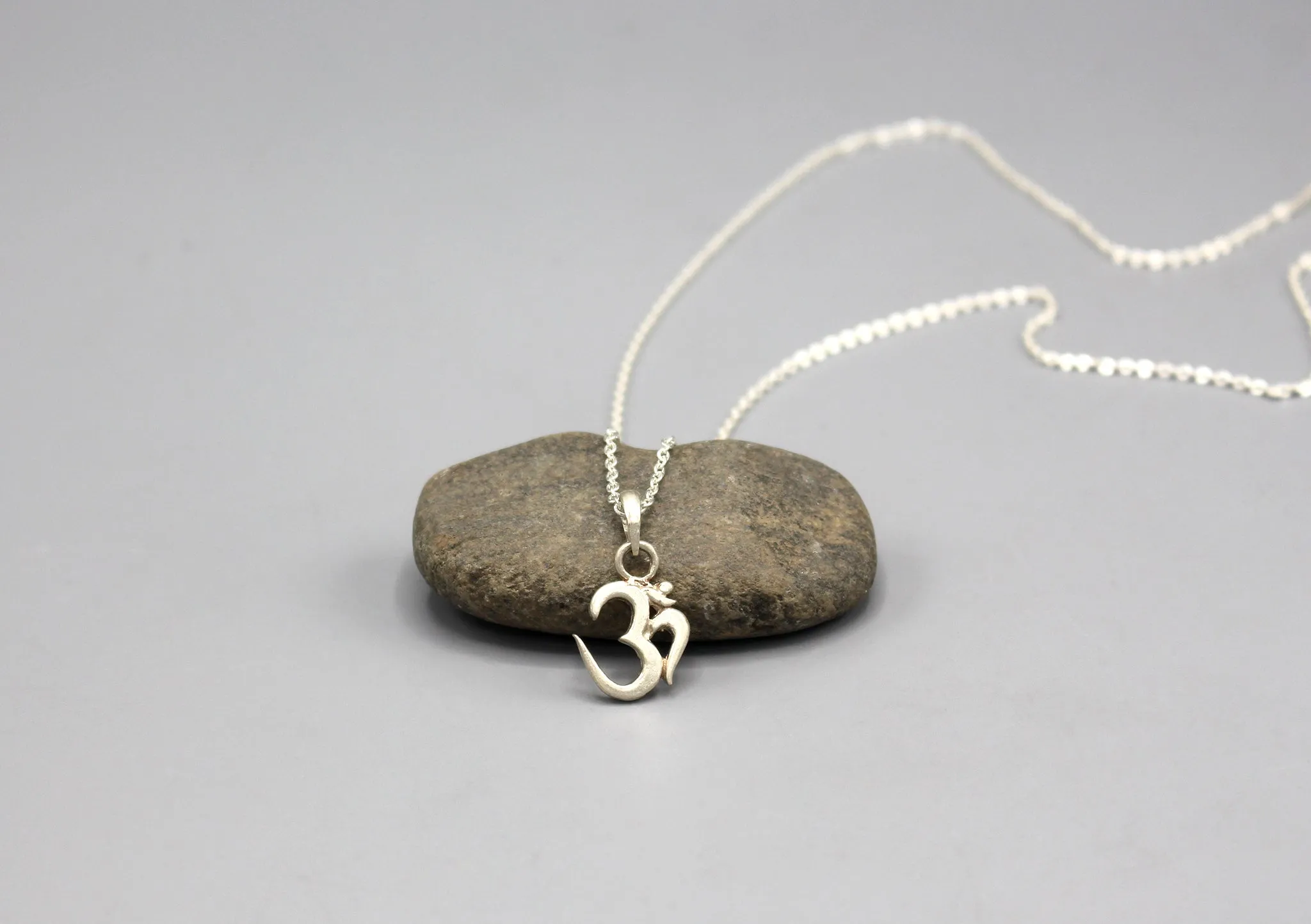 Om Carving Sterling Silver Pendant