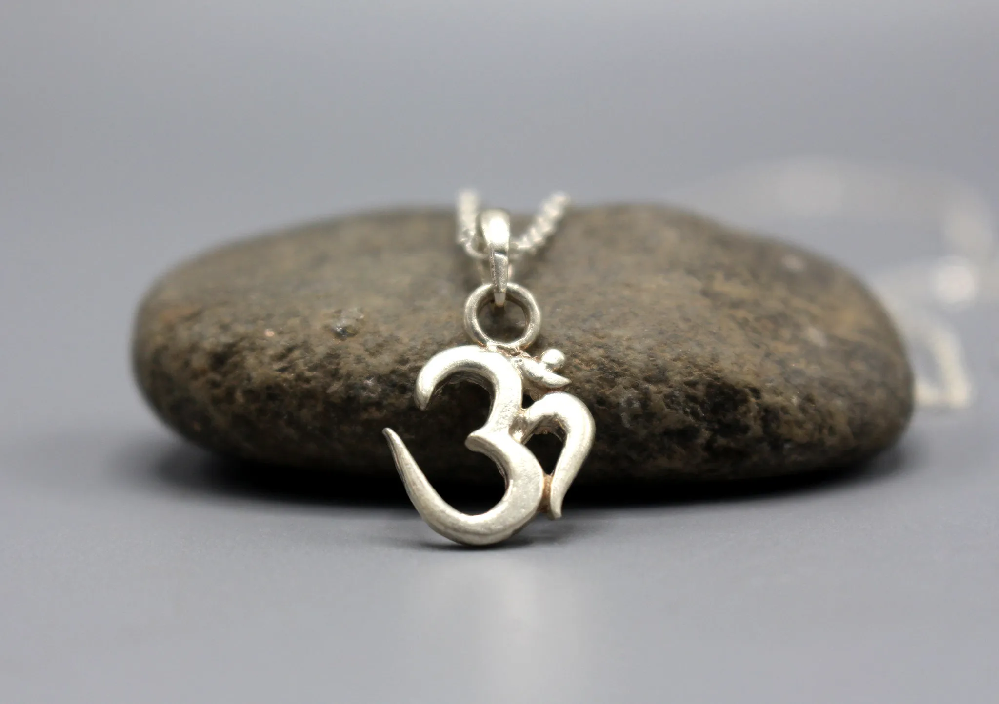 Om Carving Sterling Silver Pendant