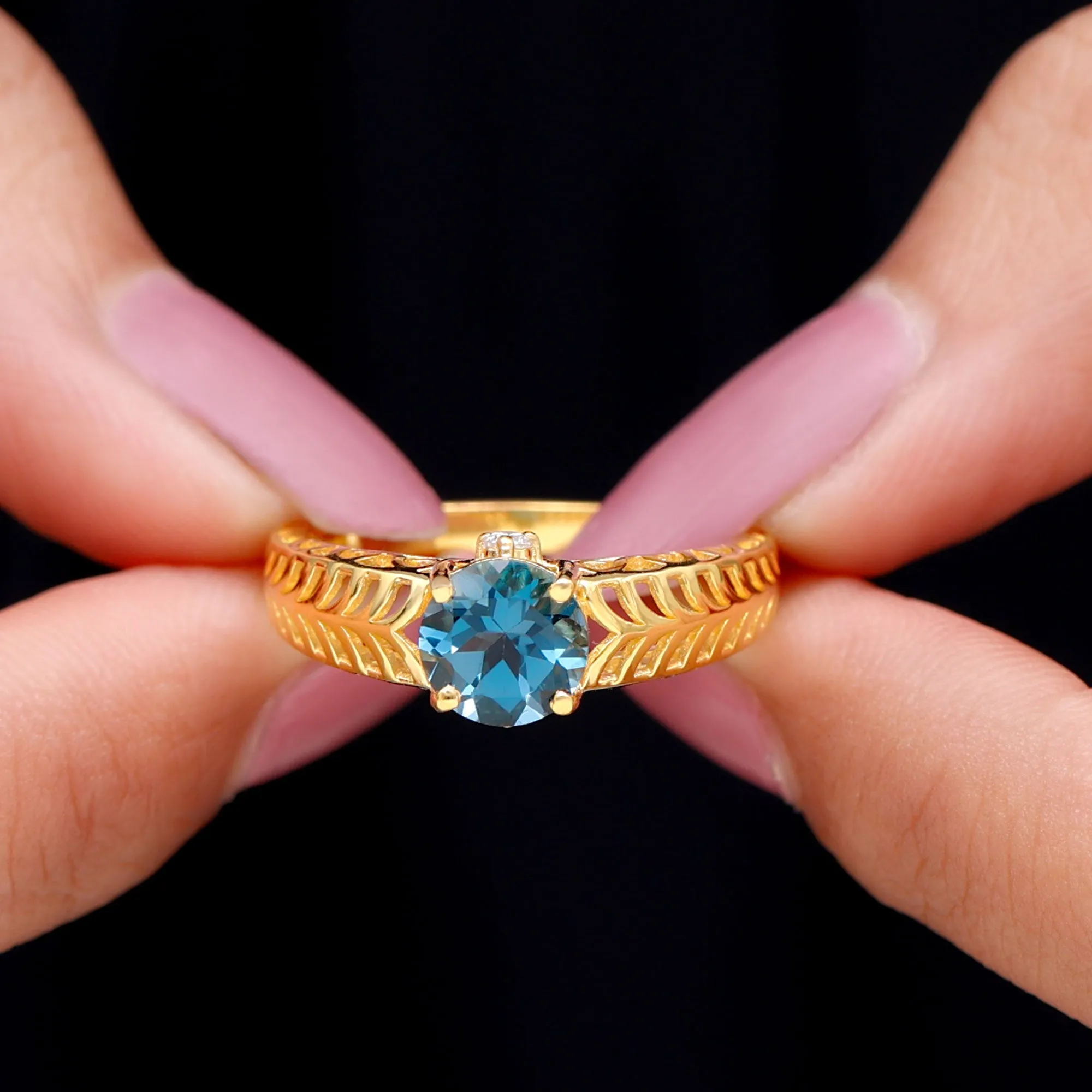 Round London Blue Topaz Solitaire Ring in Cut Out Work