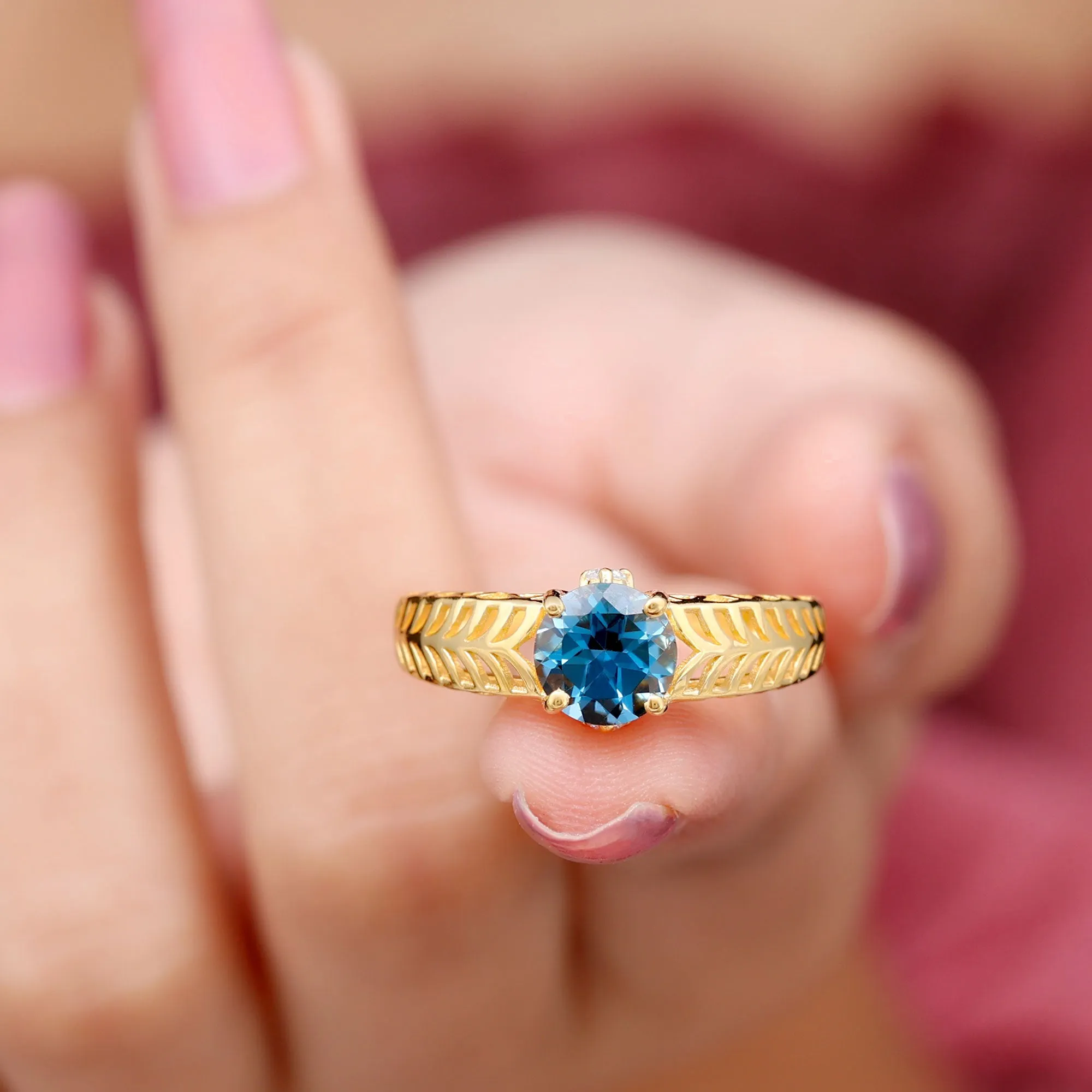 Round London Blue Topaz Solitaire Ring in Cut Out Work